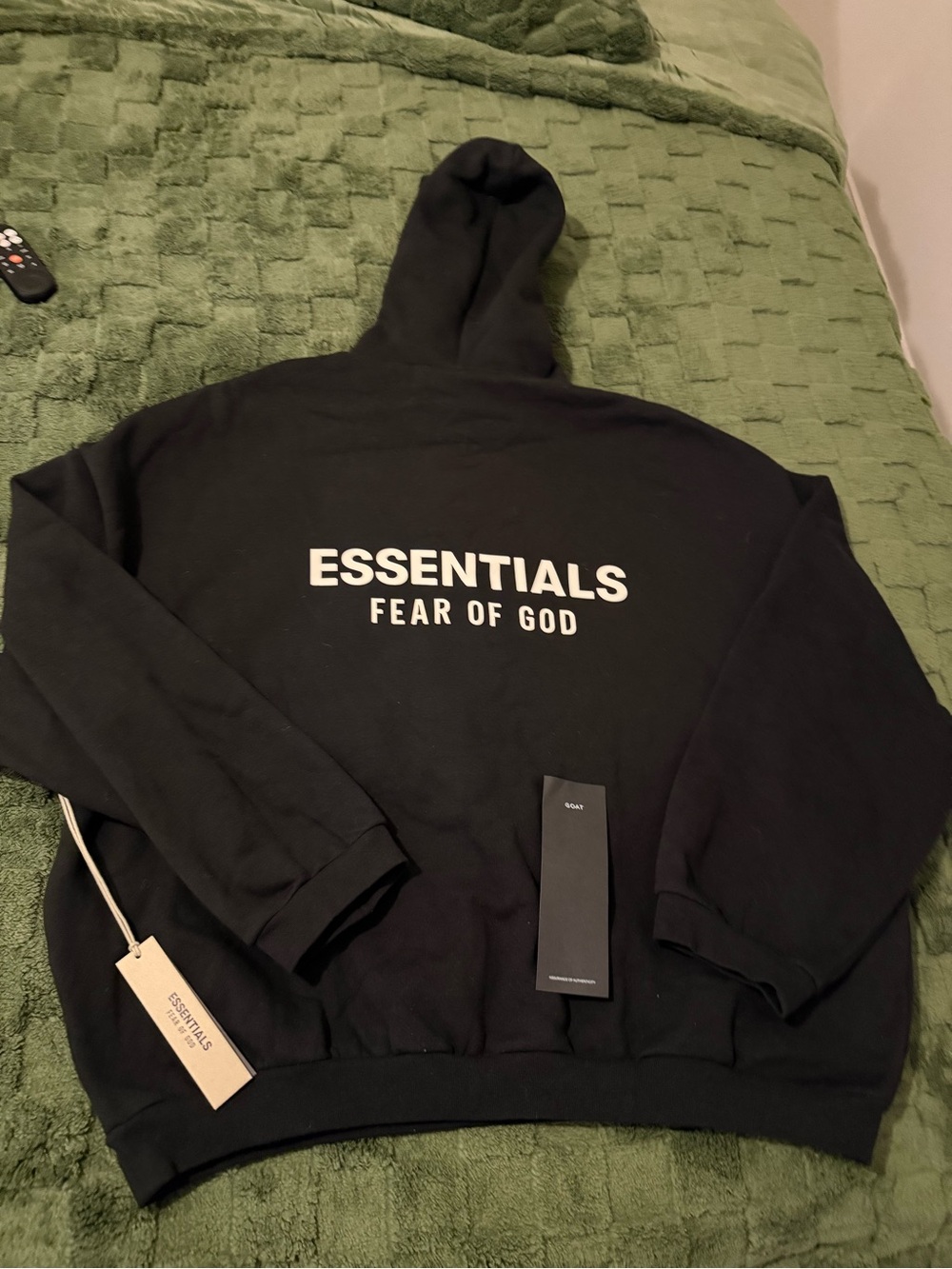 Fear of God ESSENTIALS Black Hoodie with White Back Logo